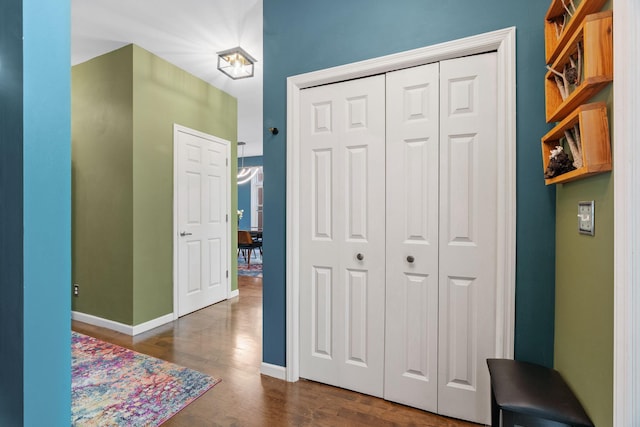 222 Ridgewood Ave, Minneapolis, MN 55403 - hall featuring dark wood finished floors and baseboards