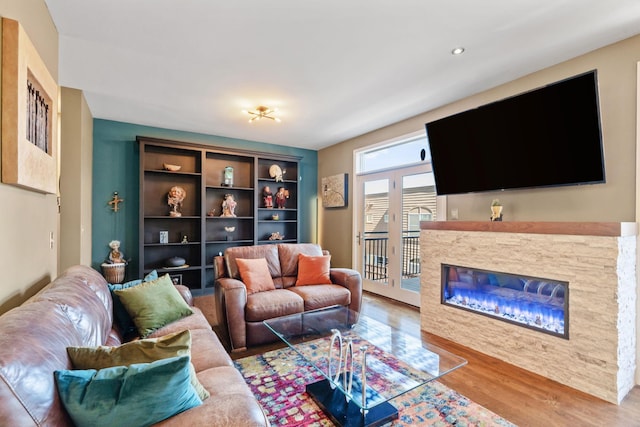 222 Ridgewood Ave, Minneapolis, MN 55403 - living room with wood finished floors and a glass covered fireplace