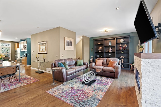 222 Ridgewood Ave, Minneapolis, MN 55403 - living room featuring light wood finished floors, baseboards, and recessed lighting