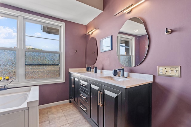 222 Ridgewood Ave, Minneapolis, MN 55403 - full bath featuring vanity, tile patterned flooring, and baseboards