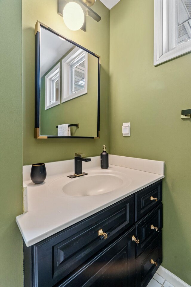 222 Ridgewood Ave, Minneapolis, MN 55403 - bathroom with vanity and tile patterned flooring
