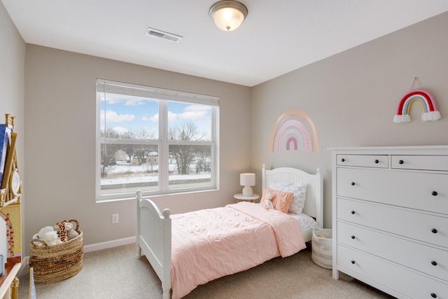 bedroom with light carpet, baseboards, and visible vents