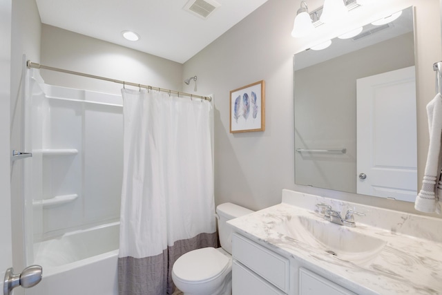 bathroom with shower / bathtub combination with curtain, vanity, visible vents, and toilet