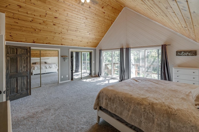 carpeted bedroom featuring access to exterior, wood ceiling, wooden walls, and high vaulted ceiling