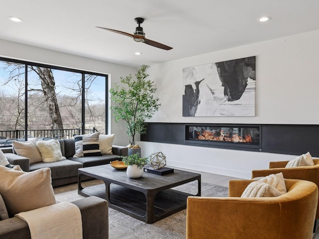 251 Glenbrook Rd N, Wayzata, MN 55391 - living area featuring recessed lighting, a ceiling fan, a high end fireplace, and wood finished floors