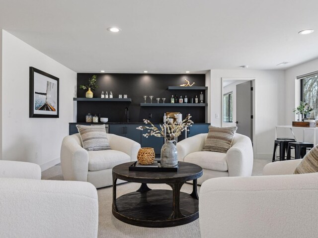 251 Glenbrook Rd N, Wayzata, MN 55391 - carpeted living room featuring recessed lighting, baseboards, built in features, and bar