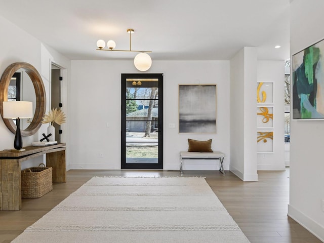 251 Glenbrook Rd N, Wayzata, MN 55391 - foyer with wood finished floors, baseboards, and recessed lighting