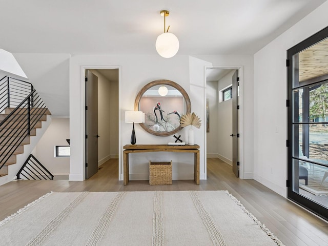 251 Glenbrook Rd N, Wayzata, MN 55391 - entrance foyer featuring wood finished floors, stairway, and baseboards