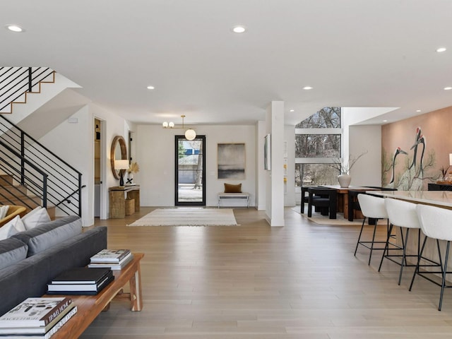 251 Glenbrook Rd N, Wayzata, MN 55391 - living room featuring stairs, light wood-style flooring, and recessed lighting