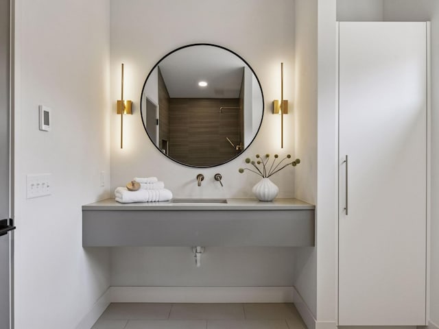 251 Glenbrook Rd N, Wayzata, MN 55391 - bathroom with baseboards, a sink, and tile patterned floors