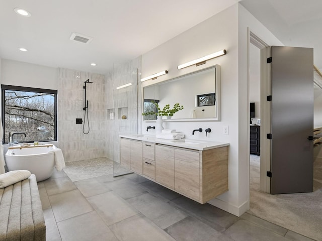 251 Glenbrook Rd N, Wayzata, MN 55391 - full bath featuring double vanity, walk in shower, a freestanding bath, and recessed lighting