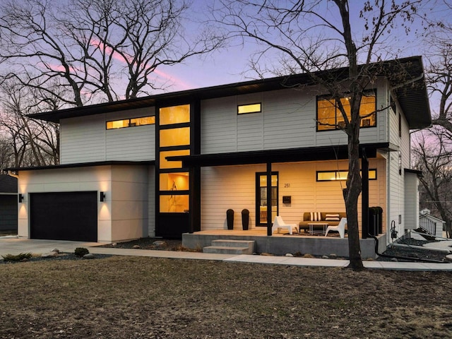251 Glenbrook Rd N, Wayzata, MN 55391 - contemporary home with outdoor lounge area and driveway