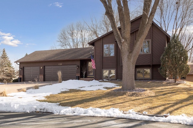 1001 Gramsey Pl, Burnsville, MN 55306 - view of front facade with a garage