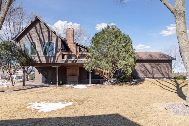 1001 Gramsey Pl, Burnsville, MN 55306 - rear view of property with a chimney and a deck