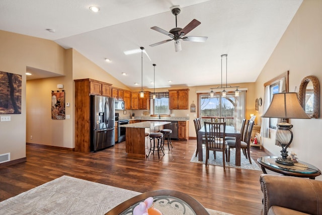 living room with a ceiling fan, visible vents, recessed lighting, baseboards, and dark wood-style floors