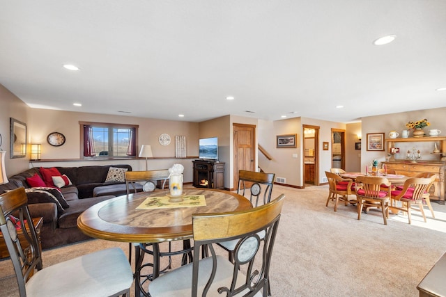 dining area with visible vents, baseboards, recessed lighting, and light carpet