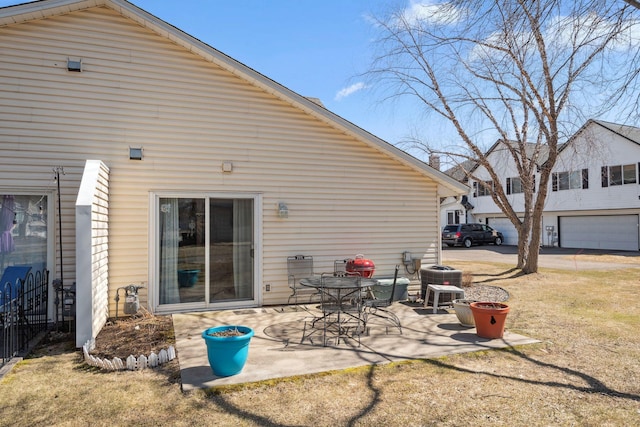 rear view of property featuring a patio and central air condition unit
