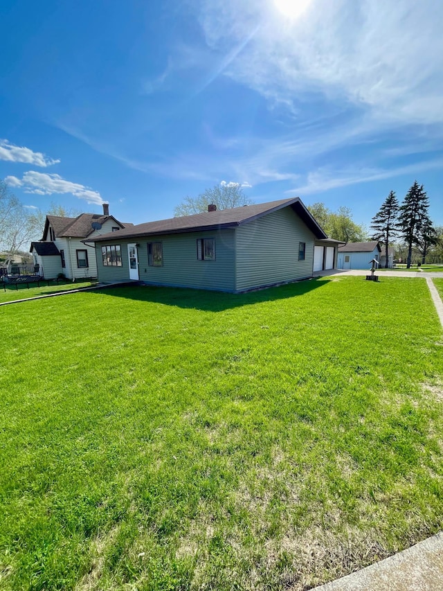 123 3rd St, Bluffton, MN 56518 - exterior space with a front lawn and driveway