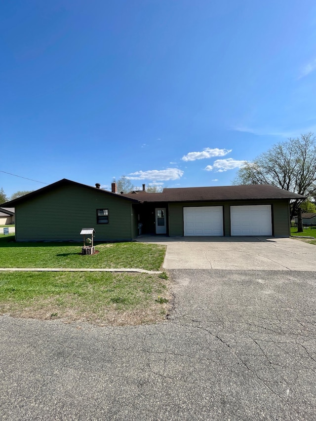 123 3rd St, Bluffton, MN 56518 - single story home featuring a garage and a front yard