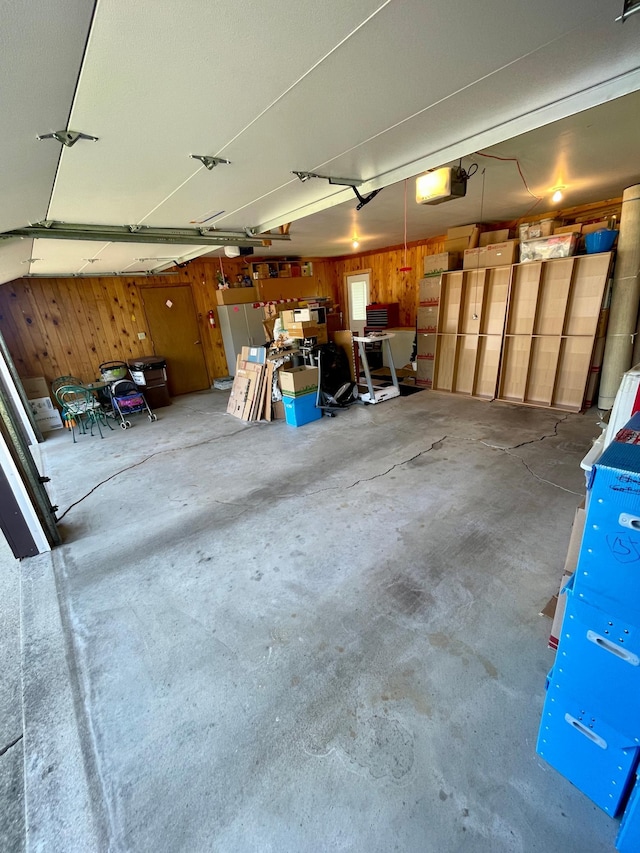 123 3rd St, Bluffton, MN 56518 - garage featuring a garage door opener
