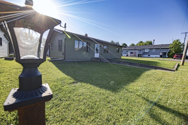 123 3rd St, Bluffton, MN 56518 - single story home with entry steps and a front yard