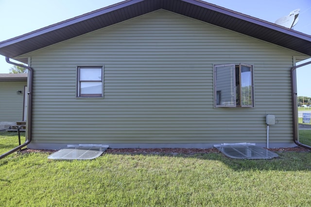 123 3rd St, Bluffton, MN 56518 - view of home's exterior featuring a lawn