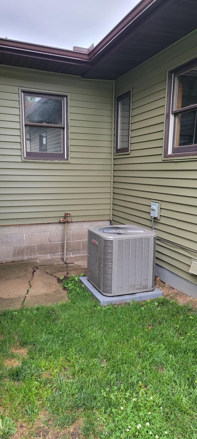 123 3rd St, Bluffton, MN 56518 - view of side of home featuring a cooling unit