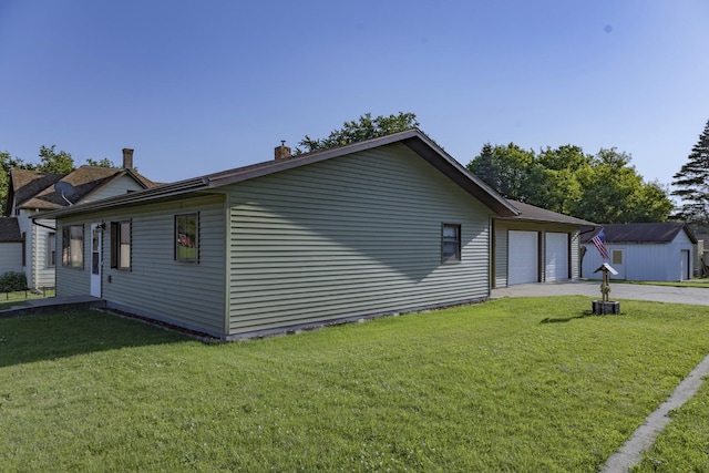 123 3rd St, Bluffton, MN 56518 - view of home's exterior with a lawn, a garage, and a chimney