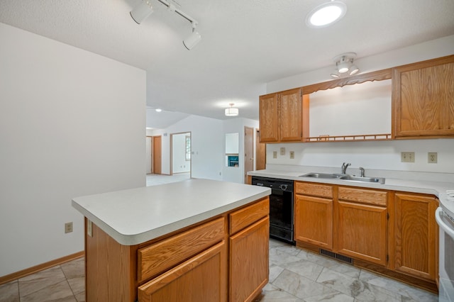 2786 87th St E Unit 18, Inver Grove Heights, MN 55076 - kitchen featuring black dishwasher, a sink, light countertops, a kitchen island, and track lighting