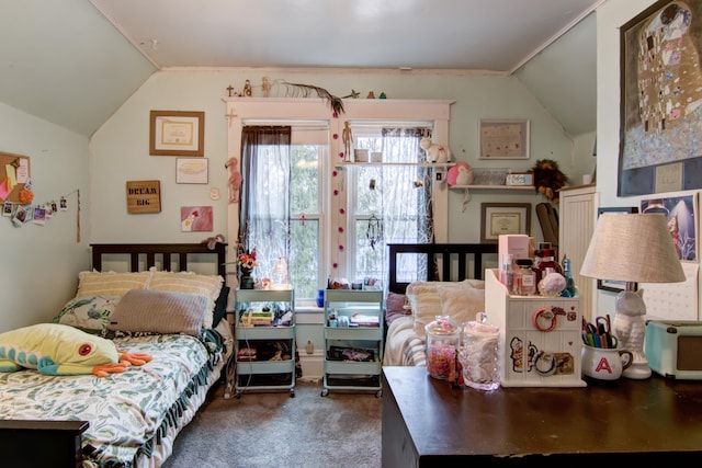 carpeted bedroom with lofted ceiling