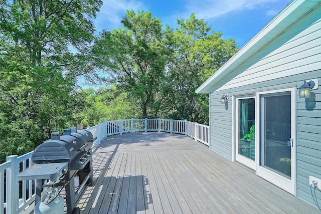 108 1st St, Kenyon, MN 55946 - deck with view of wooded area