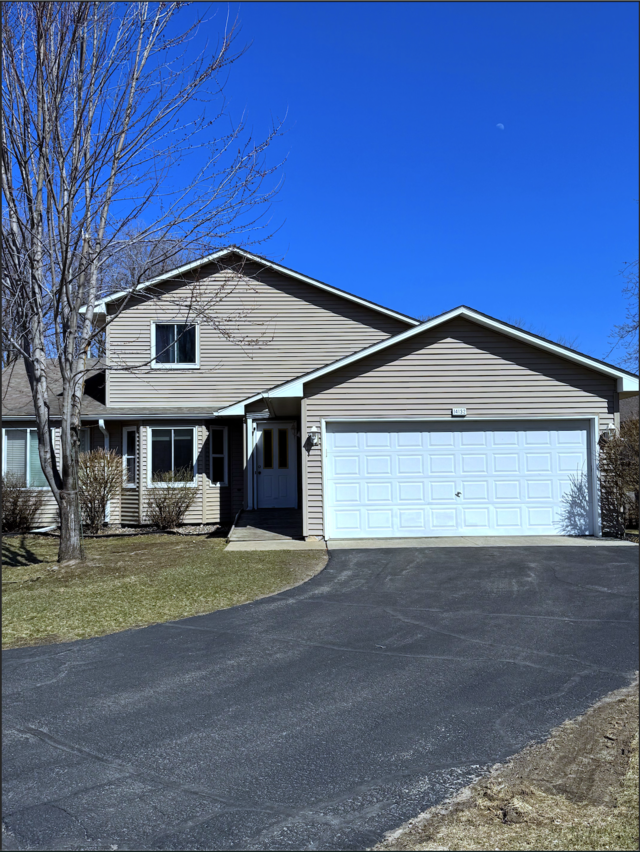 14132 Heywood Path, Apple Valley, MN 55124 - view of front of home featuring a front yard, a garage, and driveway