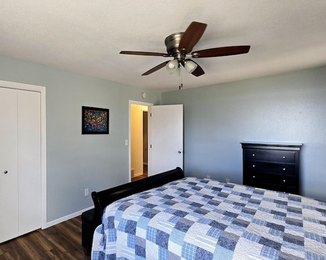 22004 Old Curry Rd SE, Cass Lake, MN 56633 - bedroom with wood finished floors, ceiling fan, baseboards, and a closet