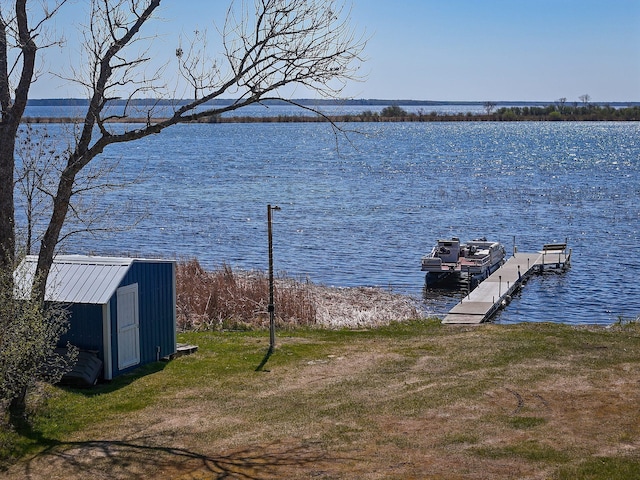 22004 Old Curry Rd SE, Cass Lake, MN 56633 - dock featuring a water view and a lawn