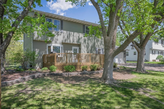 11799 191st Ave NW, Elk River, MN 55330 - back of property with a wooden deck and a lawn