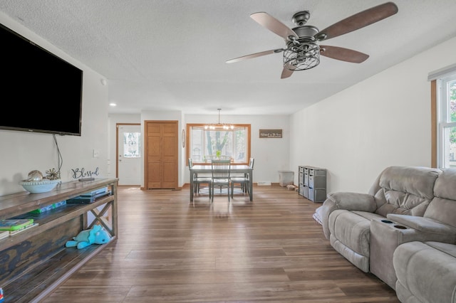 11799 191st Ave NW, Elk River, MN 55330 - living area featuring ceiling fan, wood finished floors, plenty of natural light, and a textured ceiling