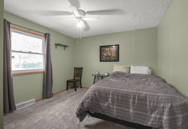 11799 191st Ave NW, Elk River, MN 55330 - bedroom with carpet floors, baseboards, a textured ceiling, and ceiling fan