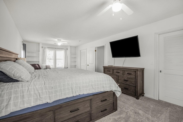 11799 191st Ave NW, Elk River, MN 55330 - bedroom with light carpet, a ceiling fan, and a textured ceiling