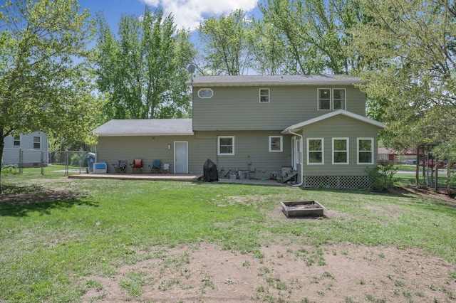 11799 191st Ave NW, Elk River, MN 55330 - back of house with a fire pit and a patio