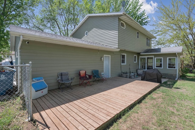 11799 191st Ave NW, Elk River, MN 55330 - back of property featuring a wooden deck and a lawn