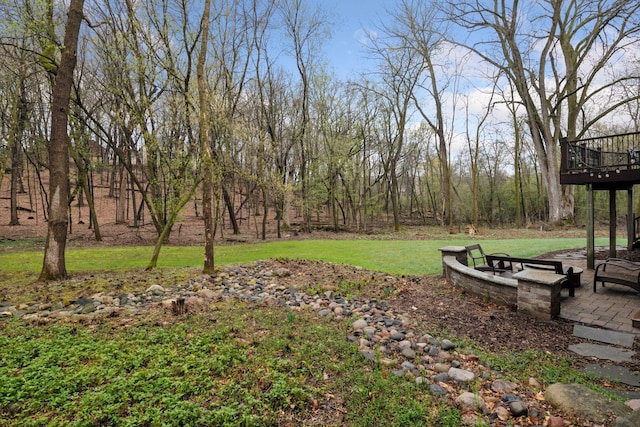 view of yard featuring a wooden deck
