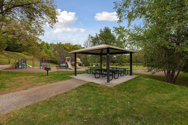view of community featuring a gazebo, a lawn, and playground community