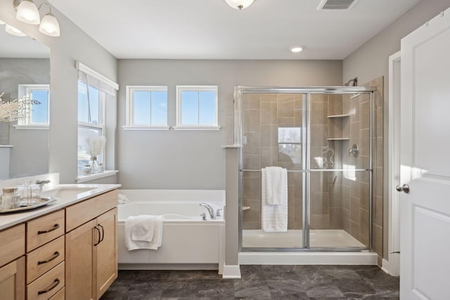 full bath featuring visible vents, a bath, a shower stall, and vanity