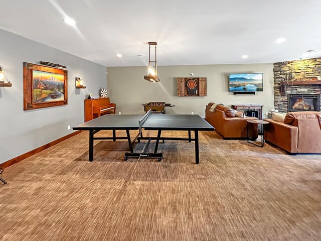 11857 Maplewood Dr, East Gull Lake, MN 56401 - game room featuring recessed lighting, a stone fireplace, and baseboards