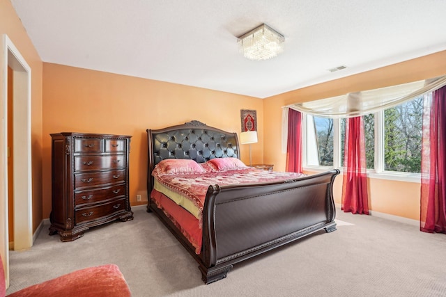 8621 Basswood Rd Unit 32, Eden Prairie, MN 55344 - bedroom featuring light colored carpet, baseboards, and visible vents