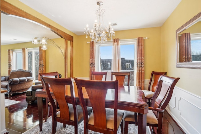 8621 Basswood Rd Unit 32, Eden Prairie, MN 55344 - dining room with a chandelier, dark wood-type flooring, wainscoting, and visible vents