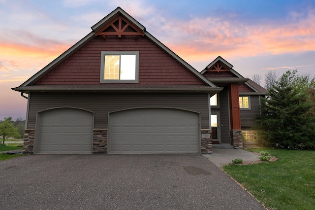 6387 203rd Ct N, Forest Lake, MN 55025 - craftsman house featuring stone siding, a garage, and asphalt driveway