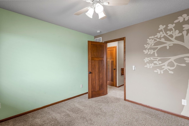6387 203rd Ct N, Forest Lake, MN 55025 - unfurnished room with light colored carpet, ceiling fan, and baseboards