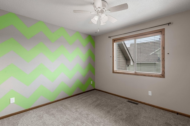 6387 203rd Ct N, Forest Lake, MN 55025 - empty room with baseboards, carpet flooring, and a ceiling fan