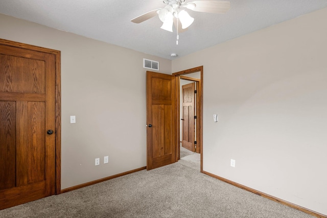 6387 203rd Ct N, Forest Lake, MN 55025 - unfurnished bedroom with carpet, baseboards, and a ceiling fan